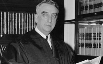 Fred M. Vinson shortly after taking the oath as an Associate Justice of the District of Columbia Court of Appeals 12 May 1938 LOC