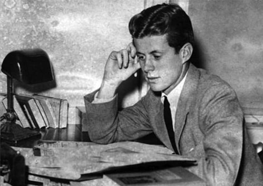 A young John F. Kennedy studying